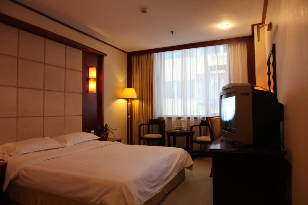 Dalian Yicheng Business Hotel Chambre photo