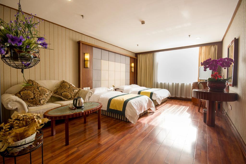 Dalian Yicheng Business Hotel Chambre photo